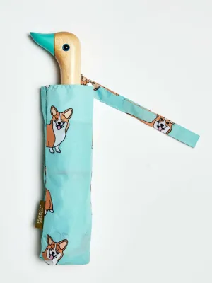 Zoom bild av Regn & rusk! Skydda dig med ett snyggt paraply