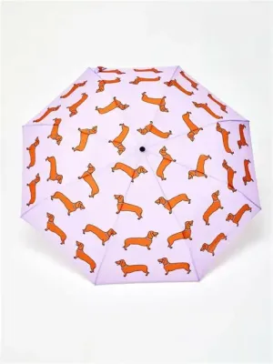 Zoom bild av Regn & rusk! Skydda dig med ett snyggt paraply